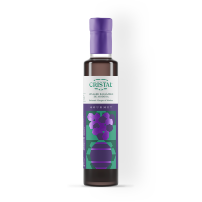 Garrafa de vinagre balsâmico de Modena com tampa roxa e rótulo colorido