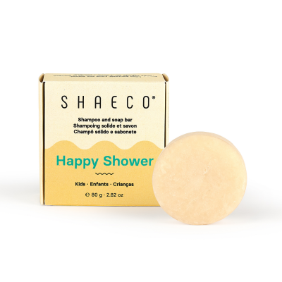 Champô e sabonete sólido SHAECÔ Happy Shower para crianças com embalagem amarela.