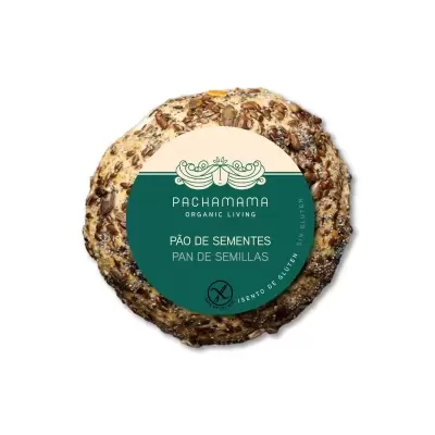 Pão de sementes redondo com etiqueta verde e bege da marca PACHAMAMA