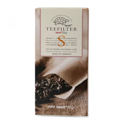 Pacote de filtros de chá teeli flip em papel não branqueado com imagem de chá e texto em bege e castanho.