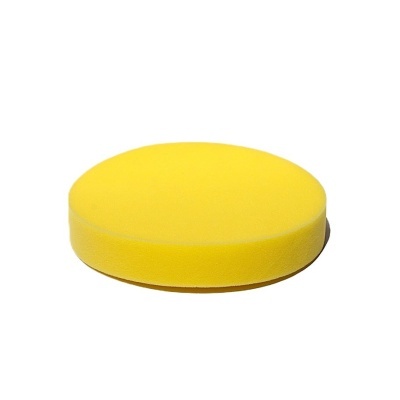 Esponja amarela circular com textura macia