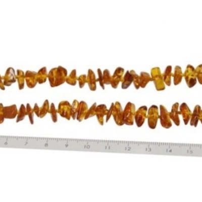 Colar de âmbar dourado com pedras irregulares e régua de 20 cm