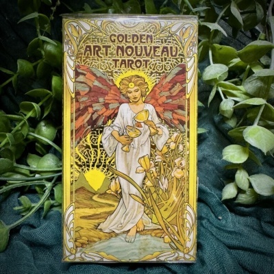 Caixa de baralho de tarot golden art nouveau com figura angelical e design dourado