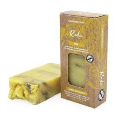 Sabonete artesanal amarelo e verde com embalagem de cartão castanho e amarelo