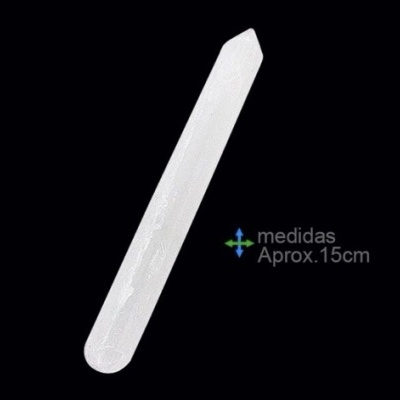 Palito branco de aproximadamente 15 cm sobre fundo preto