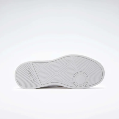 Sola branca de calçado com padrão e marca Reebok