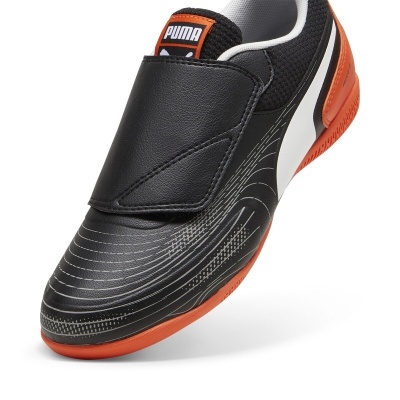 Ténis desportivo preto com detalhes brancos e sola laranja com logótipo PUMA