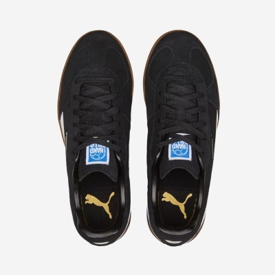 Sapatilhas Puma pretas em camurça com sola castanha e detalhes dourados