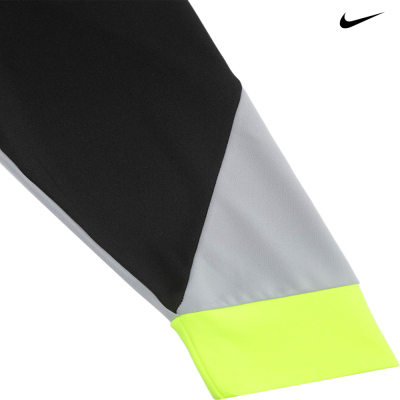Manga de roupa desportiva preta, cinzenta e amarela com logótipo Nike