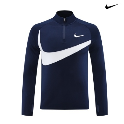 Casaco azul escuro com padrão branco e logo Nike no peito