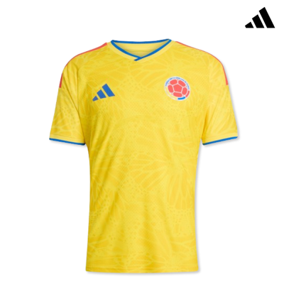 Camisola de futebol amarela com detalhes azuis e vermelhos e emblema Colombiano