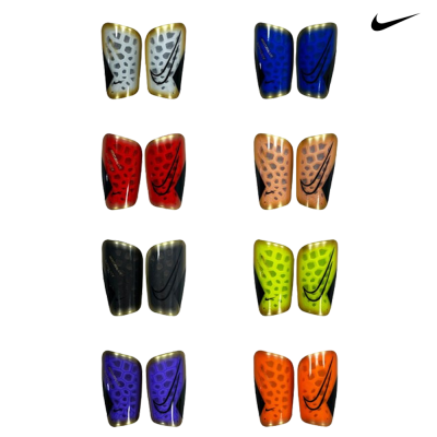 Oito pares de caneleiras Nike de futebol em várias cores com padrão e logótipo preto