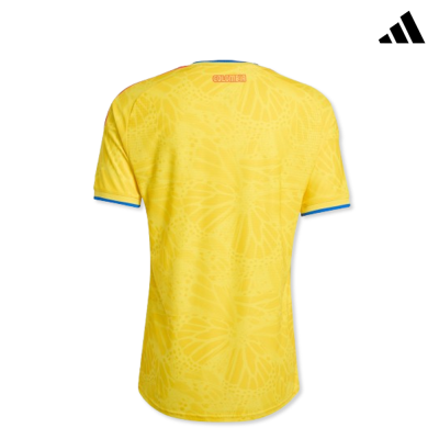 Camisola desportiva amarela da Colômbia com padrão de asas de borboleta e detalhes em azul