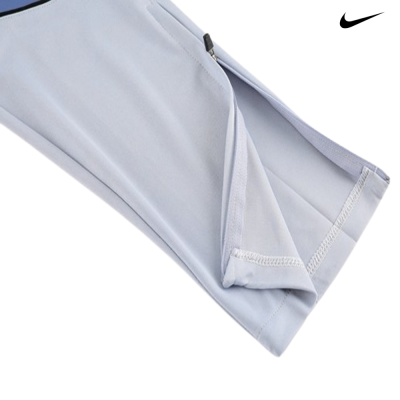 Manga de roupa desportiva cinzenta com zíper e logótipo Nike