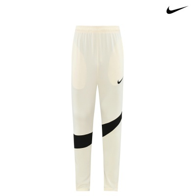 Calças desportivas Nike brancas com faixa preta