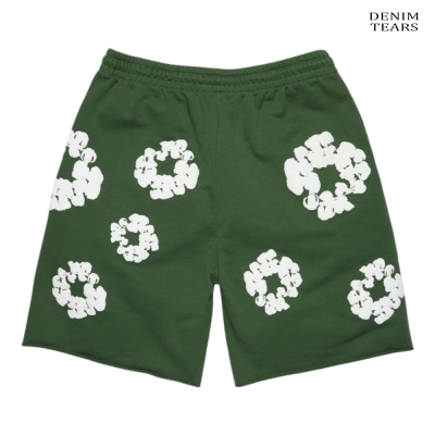 Calções verdes com estampado branco em círculos e texto DENIM TEARS