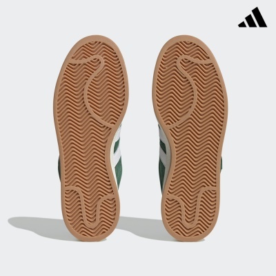 Solas de sapatos desportivos Adidas castanhas com padrão zigzag