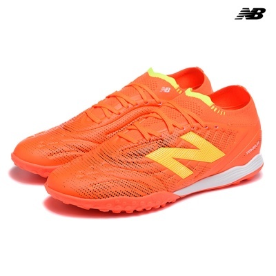Sapatilhas desportivas New Balance cor laranja com detalhes amarelos