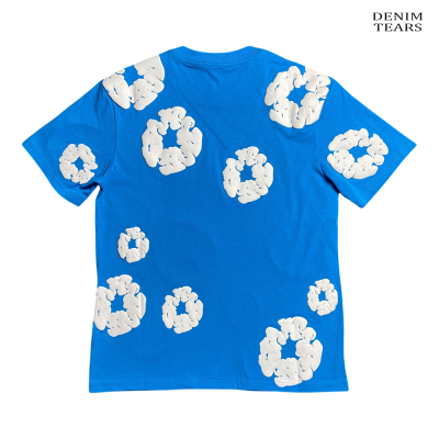 T-shirt azul com círculos brancos e texto Denim Tears