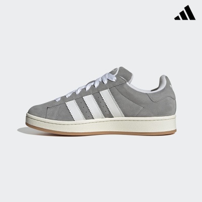 Ténis Adidas cinzento com riscas brancas e sola branca