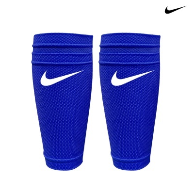 Tornozeleiras azuis com logo branco da Nike em fundo branco