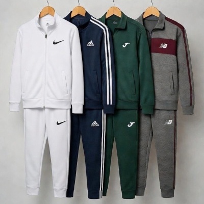 Fatos de treino pendurados em cabides, várias cores e marcas