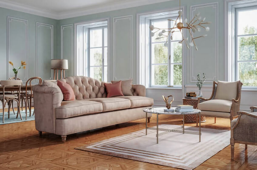 Sala de estar com sofá castanho claro almofadado e mesa de centro redonda branca