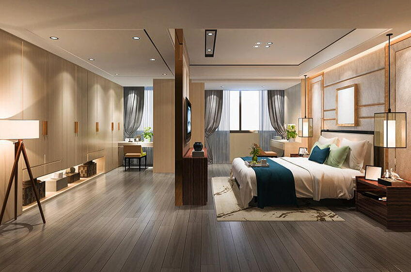 Quarto moderno com cama de casal e decoração em madeira e tecidos azuis e verdes