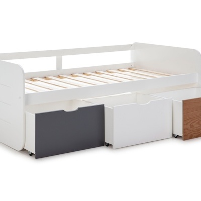 Cama de criança branca com três gavetas multicor