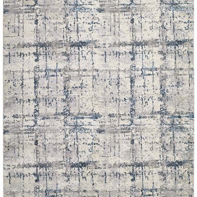 Tapete cinza, azul e bege com padrão abstrato e textura felpuda