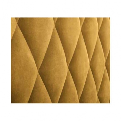 Estofado amarelo aveludado com padrão geométrico em relevo