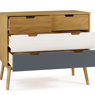 Cómoda em madeira com gavetas de várias cores e pés inclinados