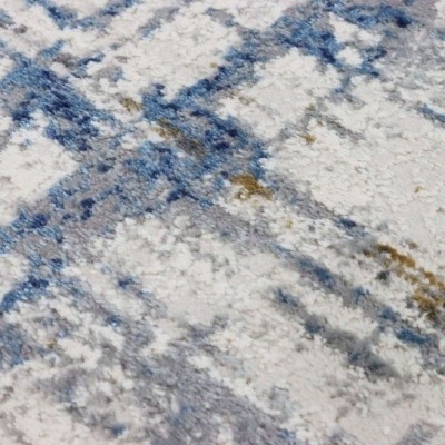 Tapete felpudo com padrão abstrato azul, cinza e branco