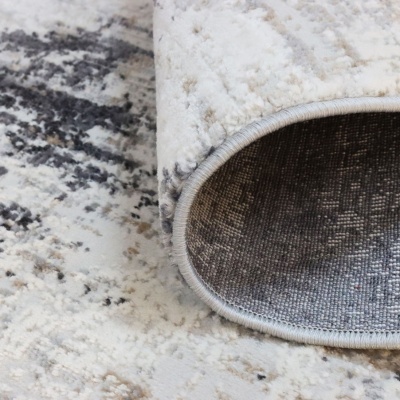 Tapete enrolado com padrão abstrato cinza e bege