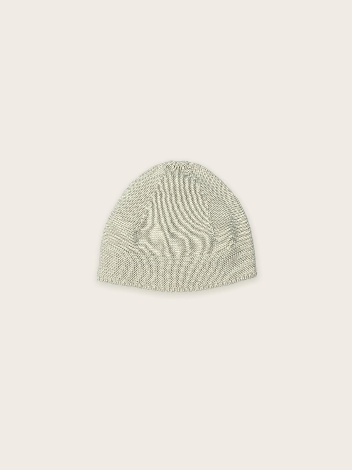 Gorro de Algodão Orgânico na cor Mousse da Mac Ilusión – Coleção Bubble Bloop Gorro de malha cinzento claro com textura tricotada