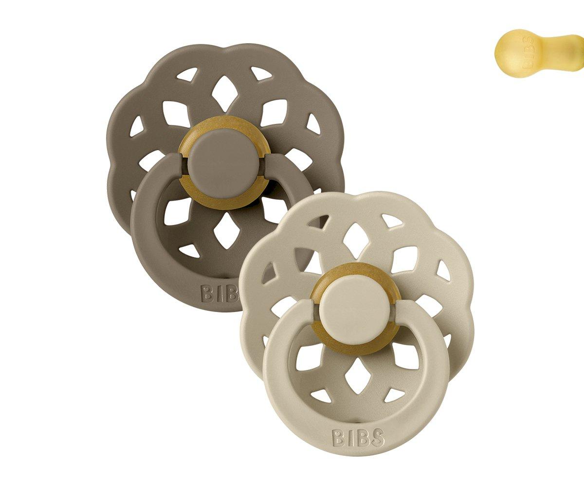 Chupeta Bibs Boheme Vanilla/Dark Oak Dois chupetas de silicone BIBS, castanho escuro e creme, com design floral recortado