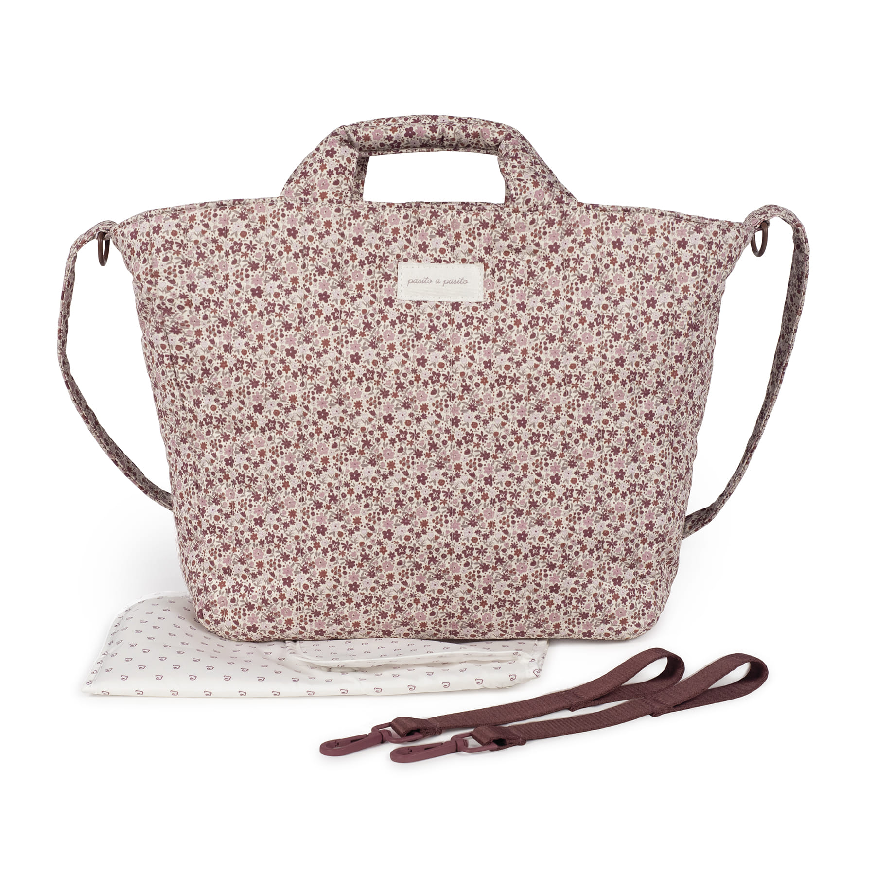 Mala de Maternidade Cherry Flowers - Rosa Cereja Pasito a Pasito Mala floral rosa e castanha com alças e acessórios em fundo branco