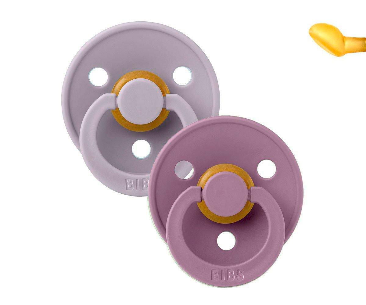 Chupeta Bibs Anatómica Fossil Grey/Mauve Dois chupetas BIBS coloridas em silicone sobre fundo branco
