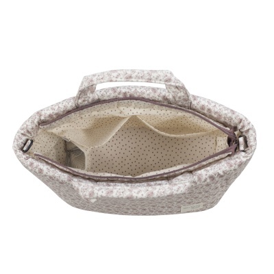 Mala em tecido com padrão floral castanho claro e interior bege com bolinhas castanhas