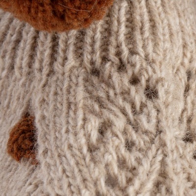 Tricot bege com pompons castanhos