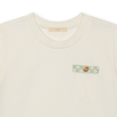 Camisola branca de bebé com detalhe xadrez verde e botão