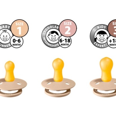 Chuchas de silicone amarelo com tamanhos para bebês e crianças em etiquetas acima