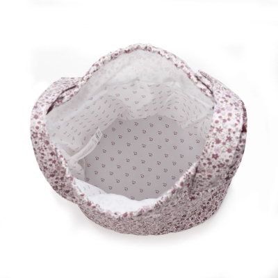 Saco de tecido com padrão floral rosa e interior com padrão de corações