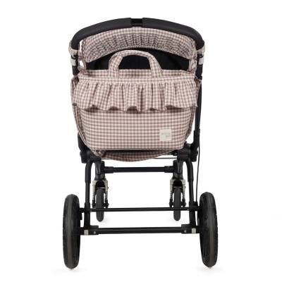 Carrinho de bebé xadrez bege e branco com estrutura preta visto de trás