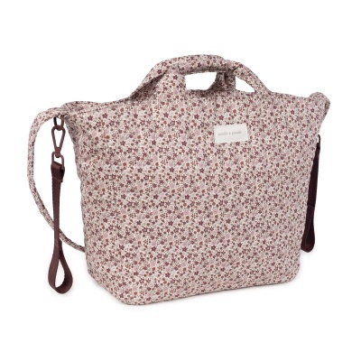 Mala de tecido floral acolchoado rosa e castanho com alça e etiqueta