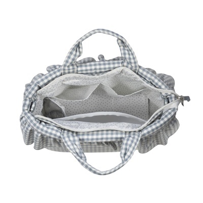 Mala de tecido cinza e branca aos quadrados vista por dentro