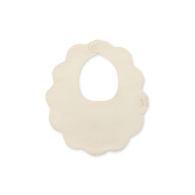 Babete de tecido bege em forma de flor com fecho de mola