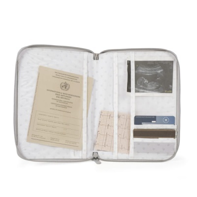 Porta-documentos branco aberto com documentos e ecografia