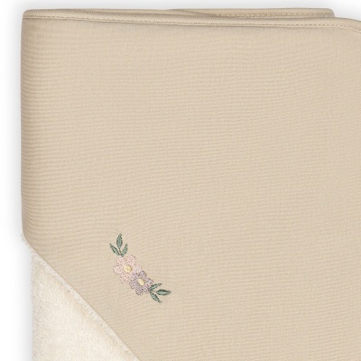 Toalha de banho bege com bordado de flores e canto felpudo branco