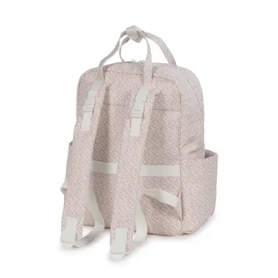 Mochila rosa claro com padrão floral vista de trás